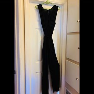 Medium black sleeveless jumpsuit.